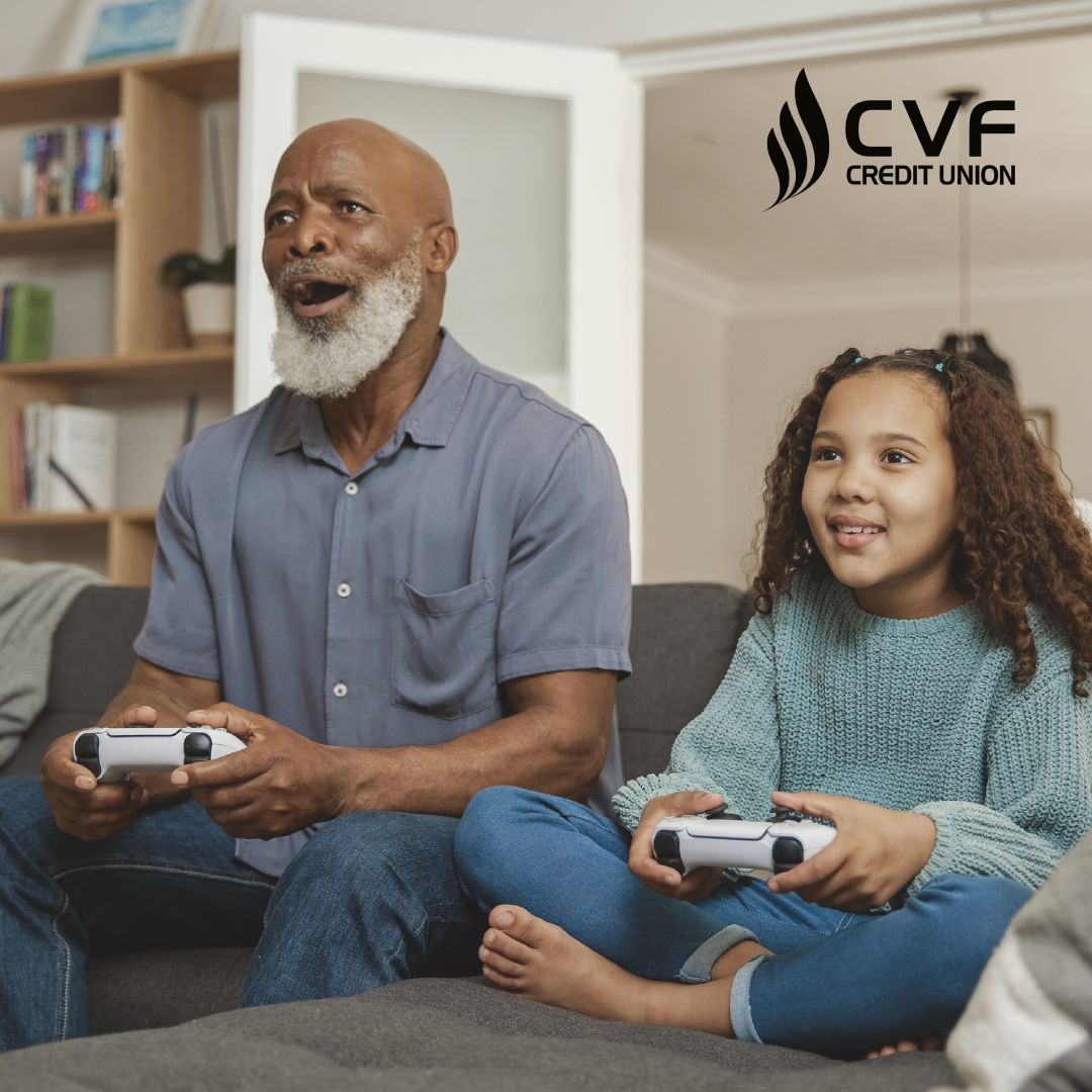 Retired grandparents playing video game with grandkid