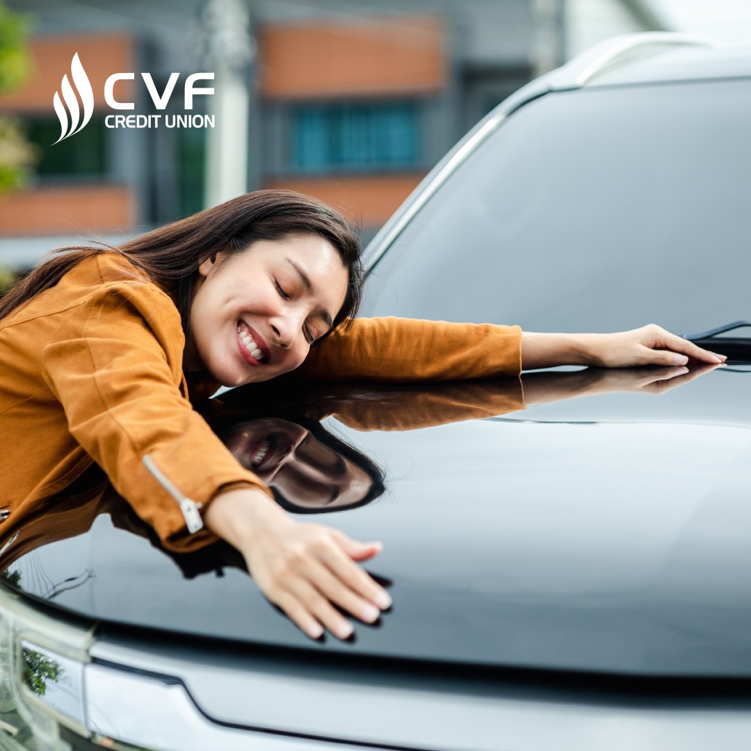 Young beautiful asian woman getting the new car. She hugged her car and was very happy. Buy or rent car concept.