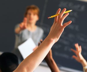 Teacher with students