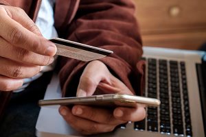 Man with Credit card and mobile phone