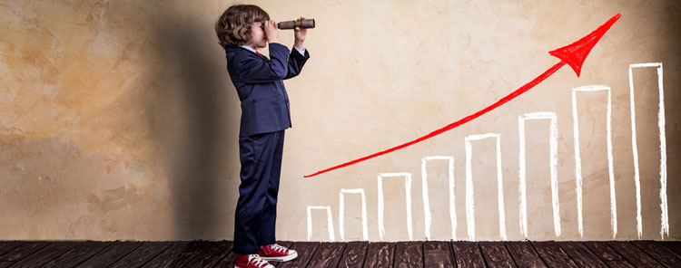 Young boy with bar chart